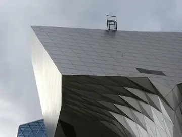 لماذا سُمِّي متحف Musée des Confluences نسبةً إلى نهرين، لا إلى متحف واحد فحسب